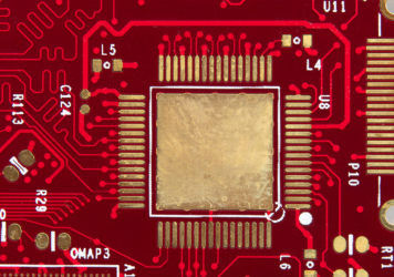 Close up of a printed circuit board via holes