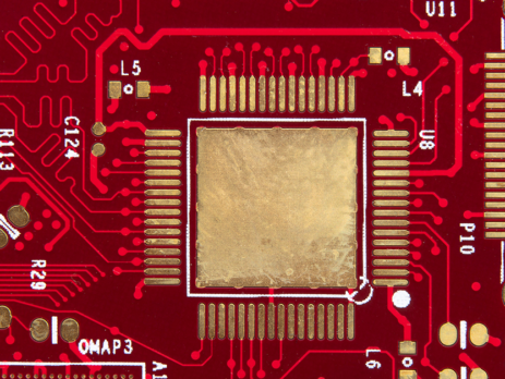 Close up of a printed circuit board via holes