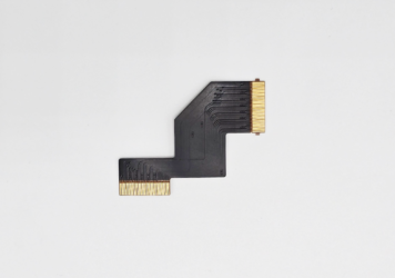 Small flex circuit with black EMI shielding