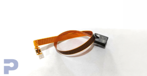 Flexible circuitry with a molded end cap coiled up