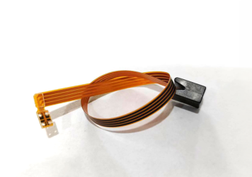 Flexible circuitry with a molded end cap coiled up